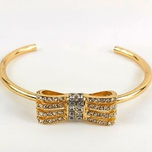 - Bcbgeneration goldtone rhinestones bow bracelet
